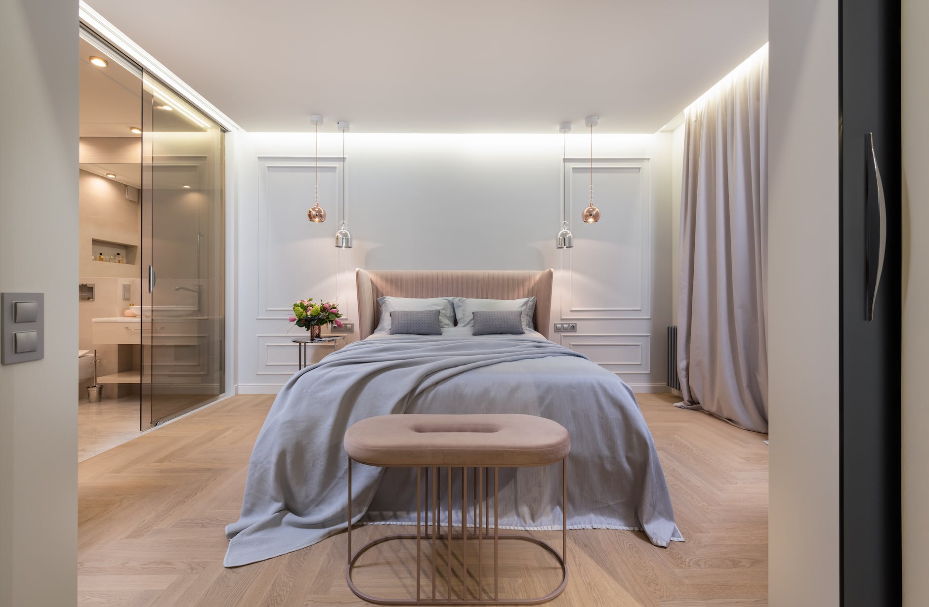 bedroom interior with bed near pouf
